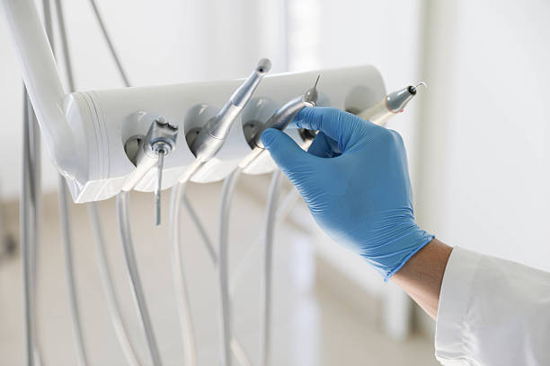 Professional Root Canal Treatment technician working in Caldwell Parish County, LA